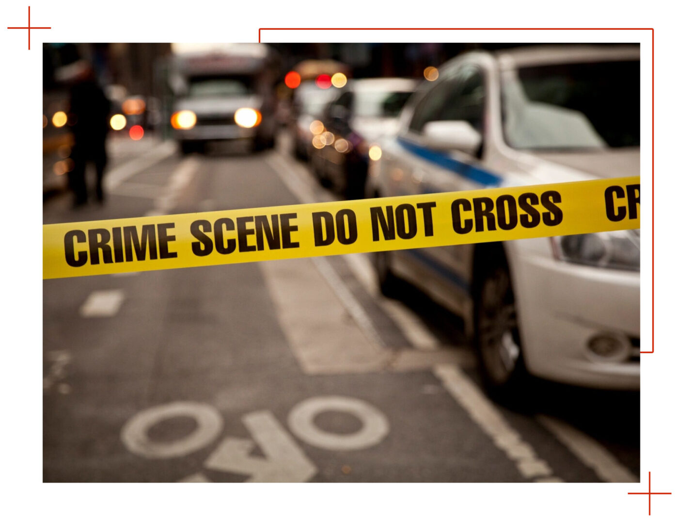 A police line of cars on the street.